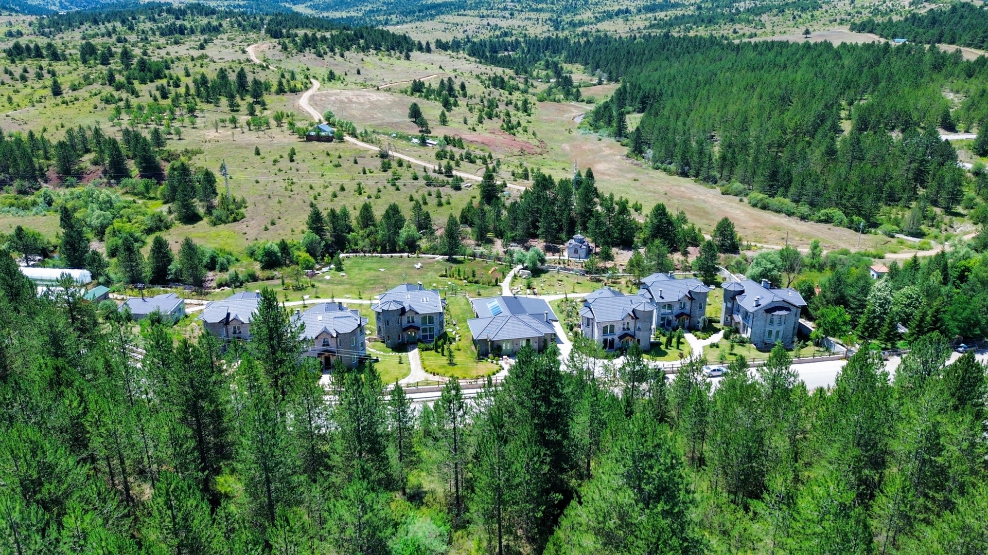 Beautiful stone arch bridge and entrance of Ura e Kovaçit agrotourism resort in Voskopojë
