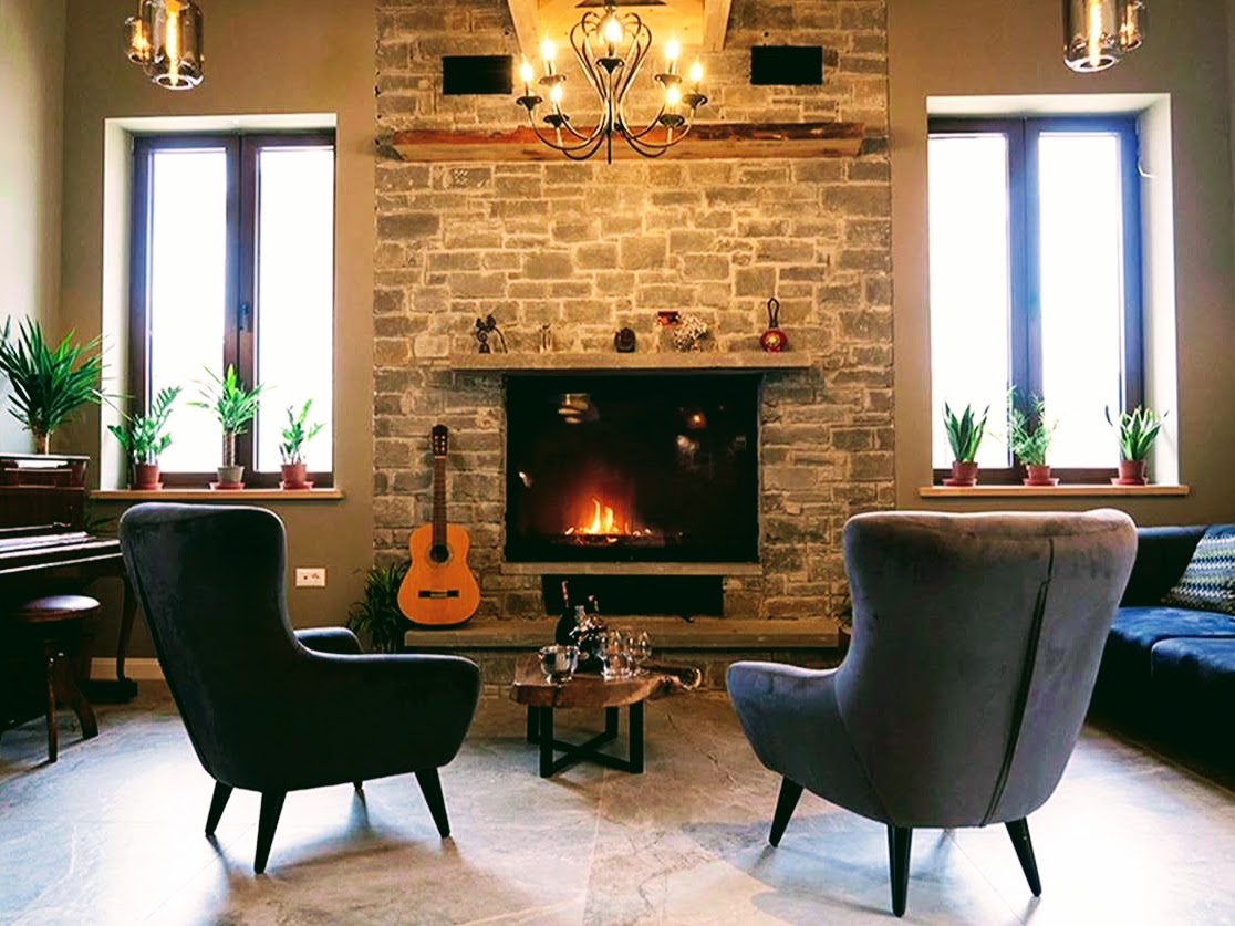 Cozy rustic guesthouse lodge lobby with warm common spaces and a fireplace
